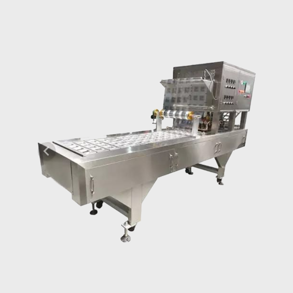 A filling and packaging machine for cups and plates for liquids